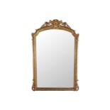 NINETEENTH-CENTURY GILT FRAMED OVER MANTLE MIRROR the rectangular plate with a serpentine top,