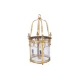 NINETEENTH-CENTURY BRASS HALL LANTERN of cylindrical form with curved glazed panels, draped with