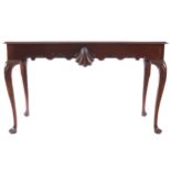 IRISH NINETEENTH-CENTURY MAHOGANY SIDE TABLE the rectangular moulded edged top, above a scallop