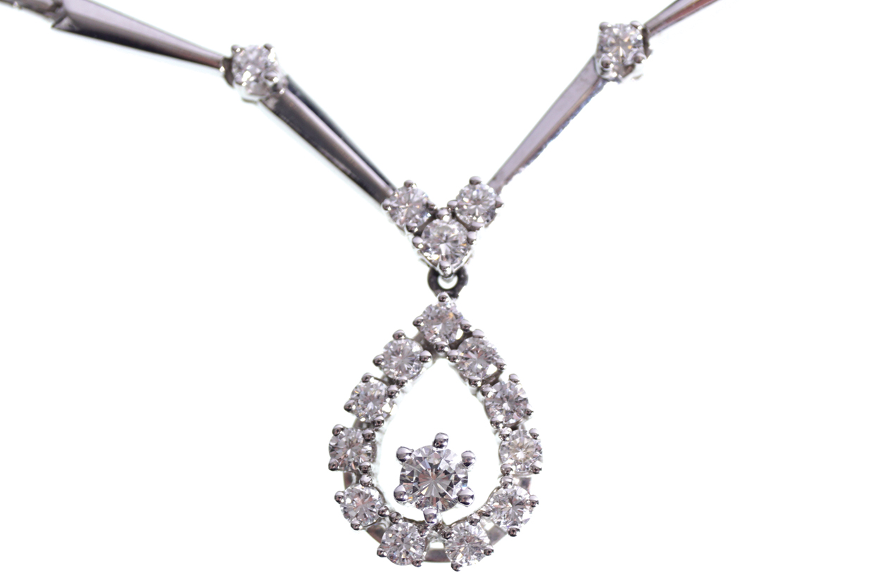 14 CT.GOLD AND 99 CT. DIAMOND NECKLACE