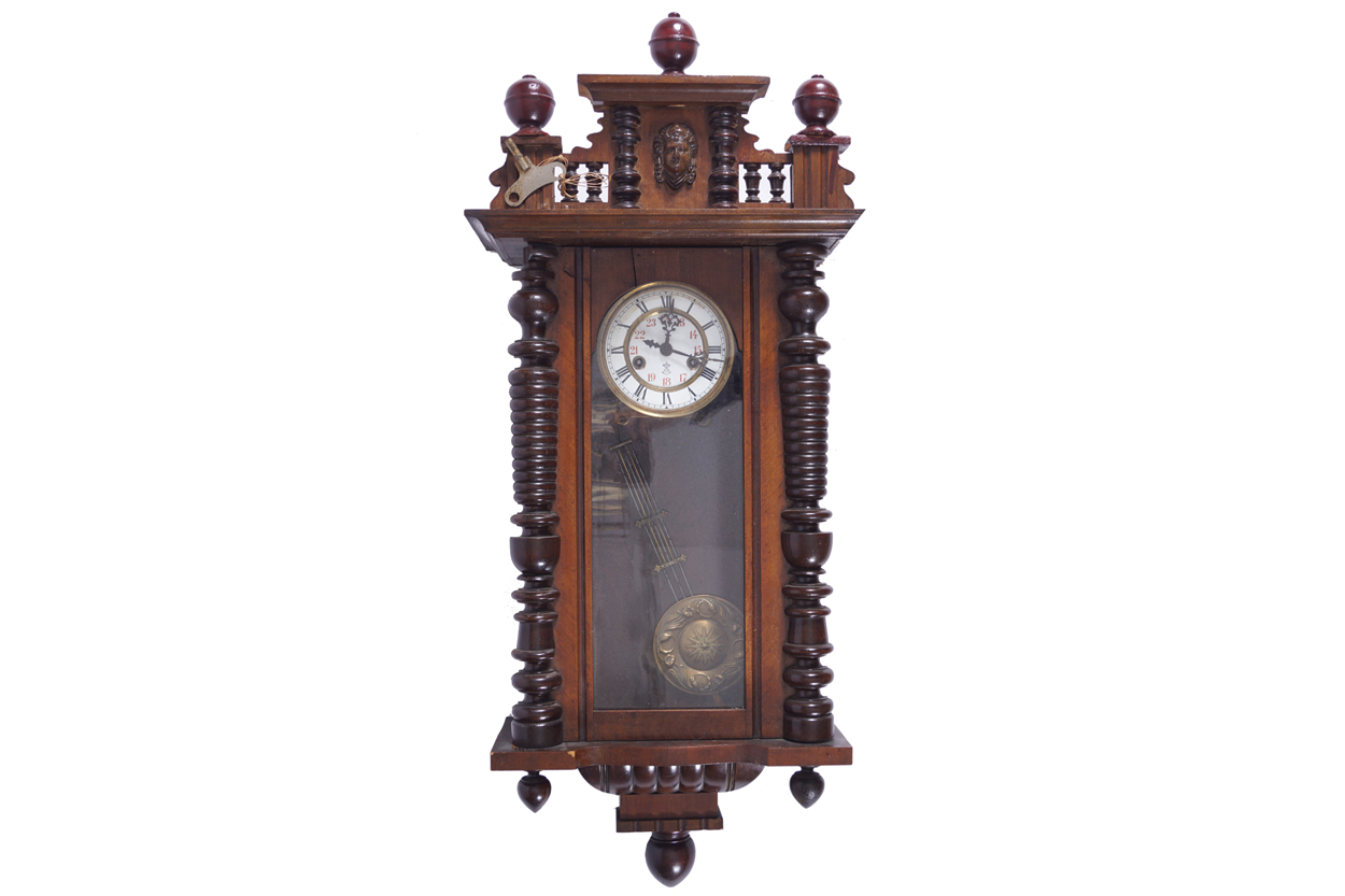 NINETEENTH-CENTURY VIENNA WALL CLOCK enclosed in a walnut frame 134 cm. high