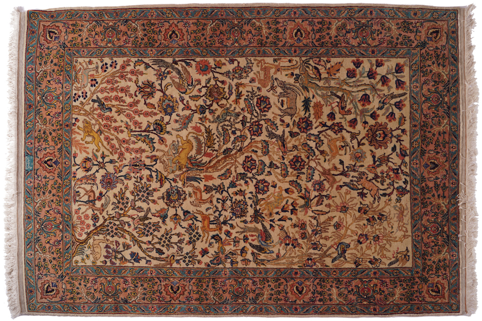 EARLY TWENTIETH-CENTURY TREE OF LIFE HUNTING RUG decorated with animals and birds, signed 143 x