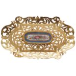 NINETEENTH-CENTURY ORMOLU AND SEVRES PORCELAIN TRAY of oval serpentine form with filigree border 2.5