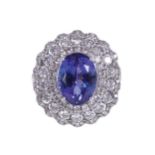 18 CT. WHITE GOLD 4.05 CT. TANZANITE AND 1.37 CT. DIAMOND RING