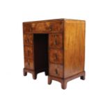 ANTIQUE WALNUT AND HERRINGBONE INLAID KNEEHOLE WRITING DESK the rectangular caddy moulded edged