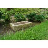 PAIR OF STONE TROUGHS 65 cm. wide (2)