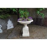 LARGE CAST IRON GARDEN URN with egg and dart moulded edge 95 cm. high; 90 cm. diameter