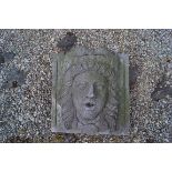CARVED LIMESTONE MASK DECORATED WALL MOUNTED FOUNTAIN HEAD 40 cm. high; 39 cm. wide