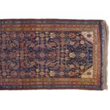 NORTH WEST PERSIAN FERAHAN RUNNER CIRCA 1900on navy ground with turquoise red and brown border470