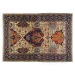 NORTH WEST PERSIAN HERIZ CARPETon ivory ground with navy border410 x 304 cm.