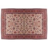 WEST PERSIAN ISFAHAN CARPETon ivory ground with all over pattern red border and outer ivory guard266