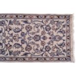 NORTH CENTRAL PERSIAN NAIN RUNNERon ivory ground with all over design and beige border284 x 66 cm.