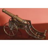 NINETEENTH-CENTURY MINIATURE CANON raised on a spindle wheel carriage Provenance: Dardistown_Castle,