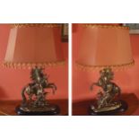 AFTER COUSTOU Pair of large nineteenth-century brass Marley horse stemmed table lamps, together with