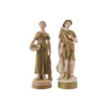 PAIR OF ROYAL DUX FIGURESgirl holding a basket with fish, the man carrying a quiver and arrows34 cm.