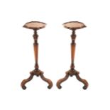 PAIR OF NINETEENTH-CENTURY WILLIAM & MARY STYLE WALNUT TORCHERESeach with a square serpentine dished