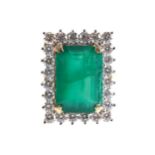 18 CT. YELLOW GOLD RECTANGULAR EMERALD AND DIAMOND CLUSTER RINGEmerald 5.76 ct.; Diamond 1.12 ct.