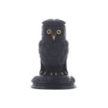 IRISH NINETEENTH-CENTURY BOG OAK INK STANDin the form of an owl, the head lifting to reveal a