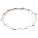 SILVER SALVERof circular serpentine form with bobbin and scallop shell beaded pie crust border,