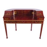 TWENTIETH-CENTURY LACQUERED CARLTON HOUSE DESKthe Chinoiserie decorated curvaceous writing surface