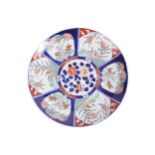 LARGE JAPANESE IMARI CHARGERof circular form, central floral cartouche ringed by alternating