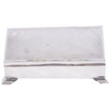 SILVER CIGAR BOXof rectangular form, raised on bracket feet. Maker: E. J. Trevitt & Sons, 1900-