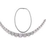 18 CT. WHITE GOLD CLAW SET GRADUATED DIAMOND NECKLACE
