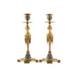 PAIR OF CHAMPLEVE ENAMELLED FIGURE STEMMED CANDLE STICKS15 cm. high (2)