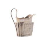 IRISH GEORGIAN SILVER CREAM JUGthe oval body with fluted corners and a scroll handle, with all