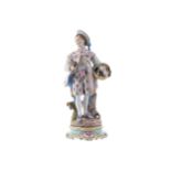 NINETEENTH-CENTURY GERMAN PORCELAIN FIGUREof a boy holding a basket of flowersProvenance: The Estate