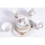 TWENTY-ONE PIECE OLD COUNTRY SPRAY CHINA TEASETComprising: 6 cups, 6 side plates, 6 saucers, cream