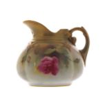 ROYAL WORCESTER PARCEL GILT AND PAINTED JUG6.5 cm. high; 7 cm. diameter