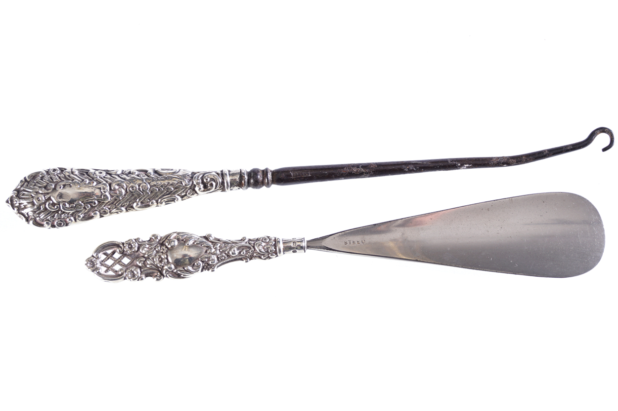 SILVER HANDLED SHOE HORN AND BODDICE HOOKProvenance: The Estate of the late Josephine Beamish,