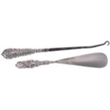 SILVER HANDLED SHOE HORN AND BODDICE HOOKProvenance: The Estate of the late Josephine Beamish,