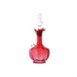 NINETEENTH-CENTURY CRANBERRY GLASS DECANTER AND STOPPERof baluster lobed form with a scroll handle28
