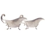 PAIR OF SILVER SAUCE BOATSwith double scroll handle, raised on hoofed feet, Sheffield 1932