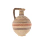 ARCHAIC POTTERY CYPRIOT WINE JUGof baluster form with polychrome decoration26 cm. high; 18 cm. wide