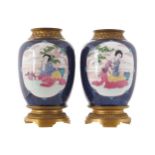 PAIR OF QING PERIOD ORMOLU MOUNTED VASESeach of bulbous form with power blue glaze and white