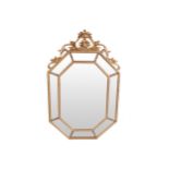 EDWARDIAN GILT FRAMED CUSHION MIRRORthe elongated hexagonal shaped plate, surrounded by smaller