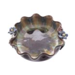 LIEZEN ART POTTERY BOWLof circular serpentine lobed form, with raised floral decoration7 cm. high;