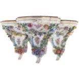 GROUP OF THREE DRESDEN PORCELAIN FLOWER ENCRUSTED WALL BRACKETSProvenance: The Estate of the late