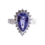 18 CT. WHITE GOLD PEAR SHAPED TANZANITE CLUSTER RING surrounded by diamonds Tanzanite 3.04 ct.;