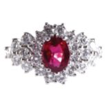 18 CT. WHITE GOLD BRILLANT CUT OVAL RUBY AND DIAMOND CLUSTER RINGRuby 2.39 ct. surrounded by