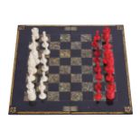 NINETEENTH-CENTURY CHINESE CARVED AND STAINED IVORY CHESS PIECESwith mother o’pearl lacquered