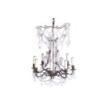 LATE NINETEENTH-CENTURY FRENCH BRASS AND CRYSTAL CHANDELIER 70 cm. high; 40 cm. diameter