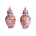 PAIR OF NINETEENTH-CENTURY JAPANESE VASESeach of baluster form with a domed lid and turned