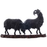 PAIR OF SIGNED NINETEENTH-CENTURY JAPANESE MEIJI PERIOD BRONZE GOATS signed on the underside35 cm.