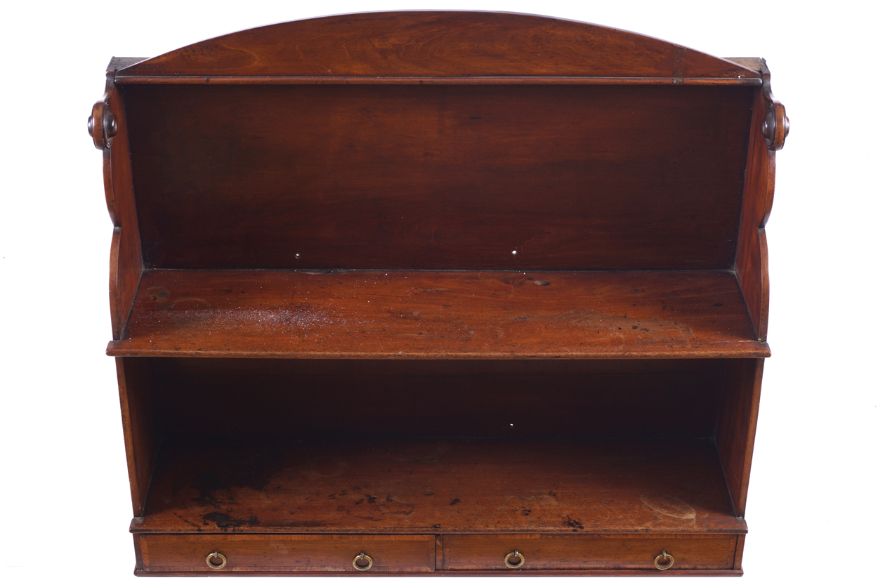 GEORGE III MAHOGANY HANGING WALL BRACKET a series of open shelves, between scroll panelled ends,