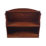 GEORGE III MAHOGANY HANGING WALL BRACKET a series of open shelves, between scroll panelled ends,