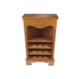 PINE COMBINED BOOKSHELF AND WINE RACK Provenance: The Robinson Collection 114 cm. high; 65 cm. wide;